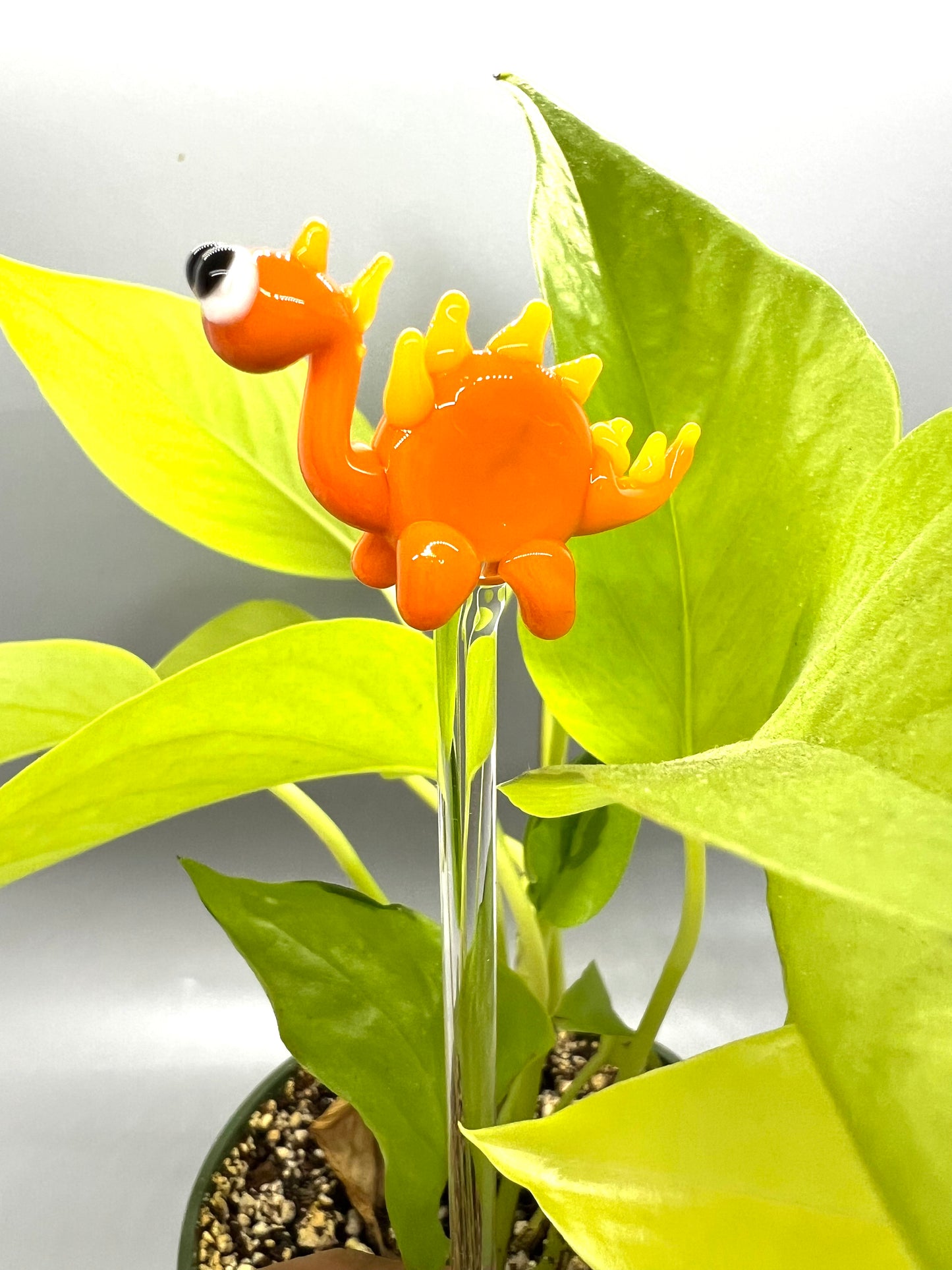 Orange Dinosaur Glass Plant Stake