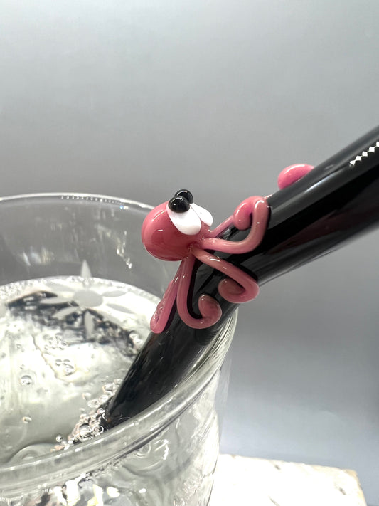 Pink Octopus on a Bent Black Straw
