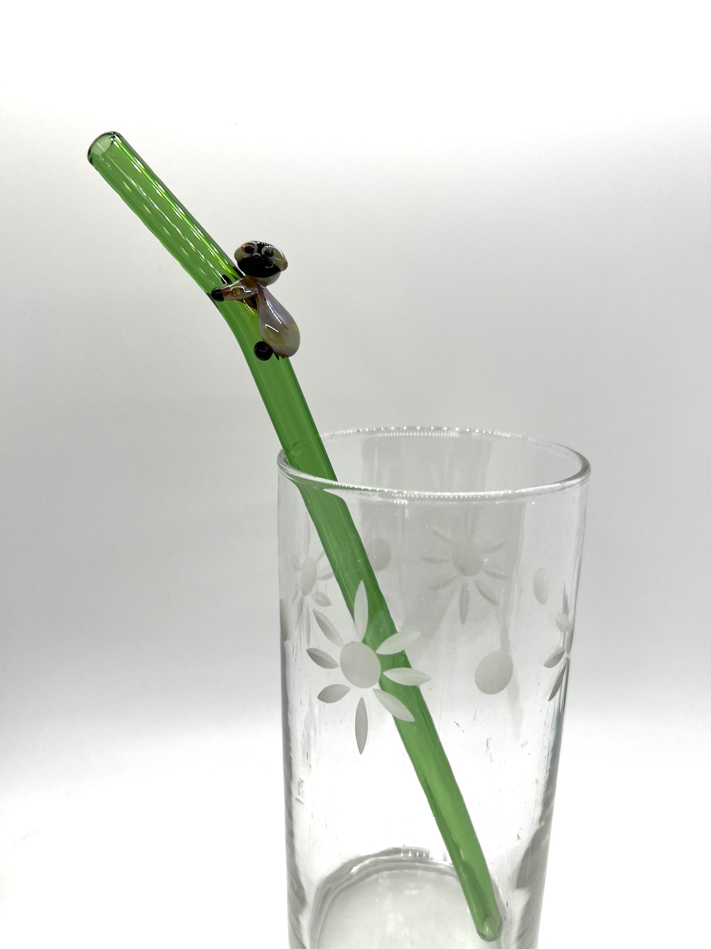 Sloth on Green Bent Straw