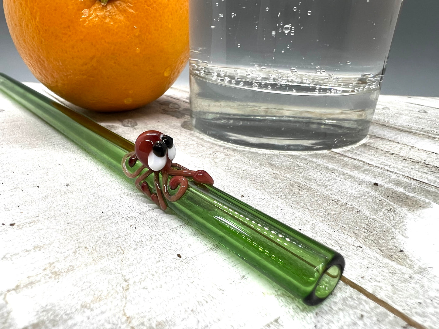 Red Octopus on a Straight Green Straw