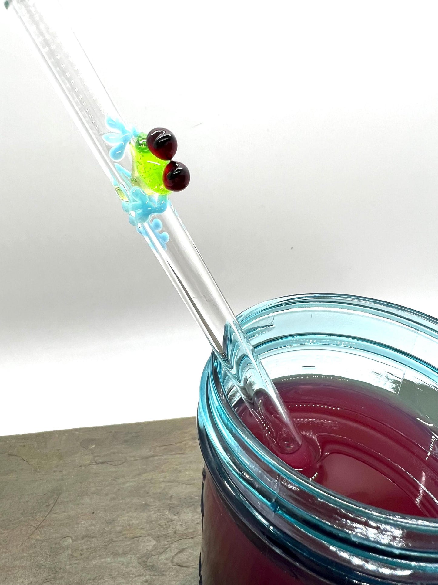 Tree Frog on Clear Glass Straw