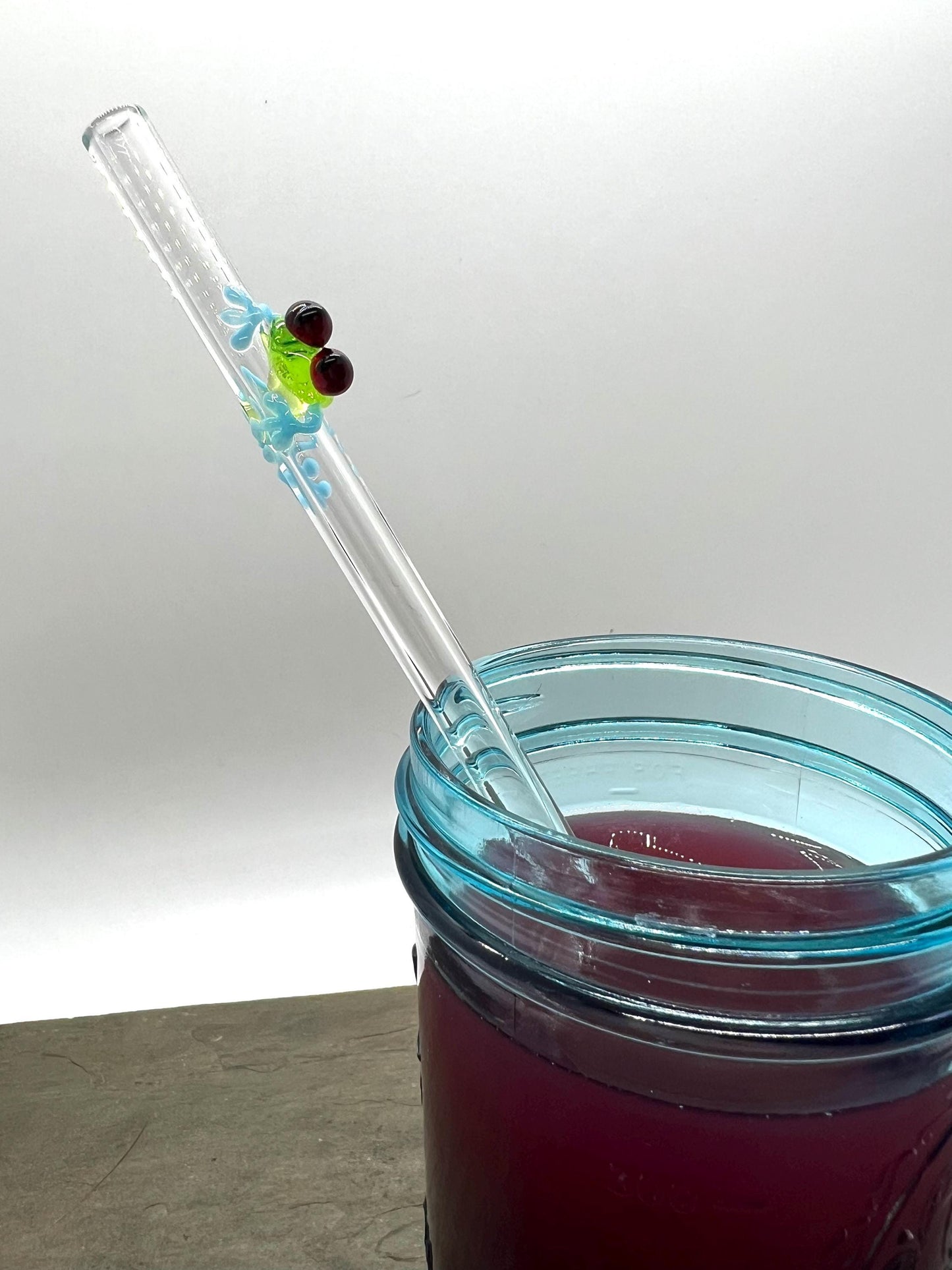 Tree Frog on Clear Glass Straw