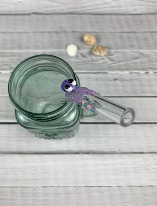 Purple Octopus and Shell on Bent Clear Glass Straw