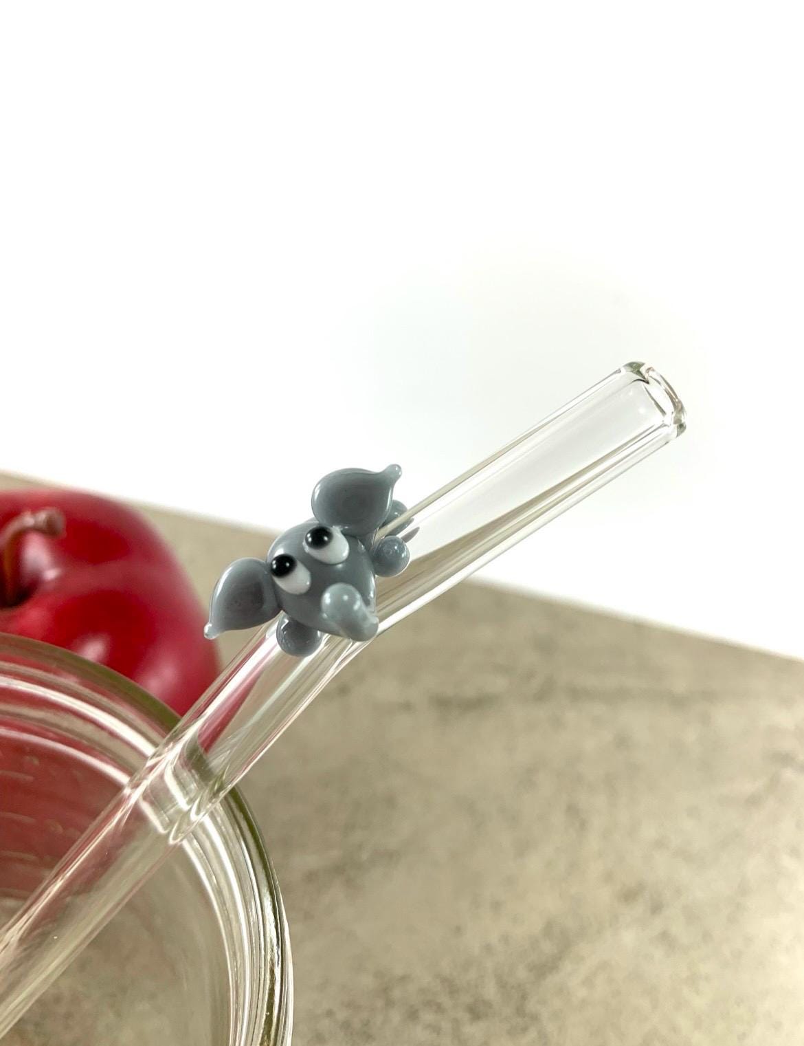 Gray Elephant on Bent Clear Glass Straw
