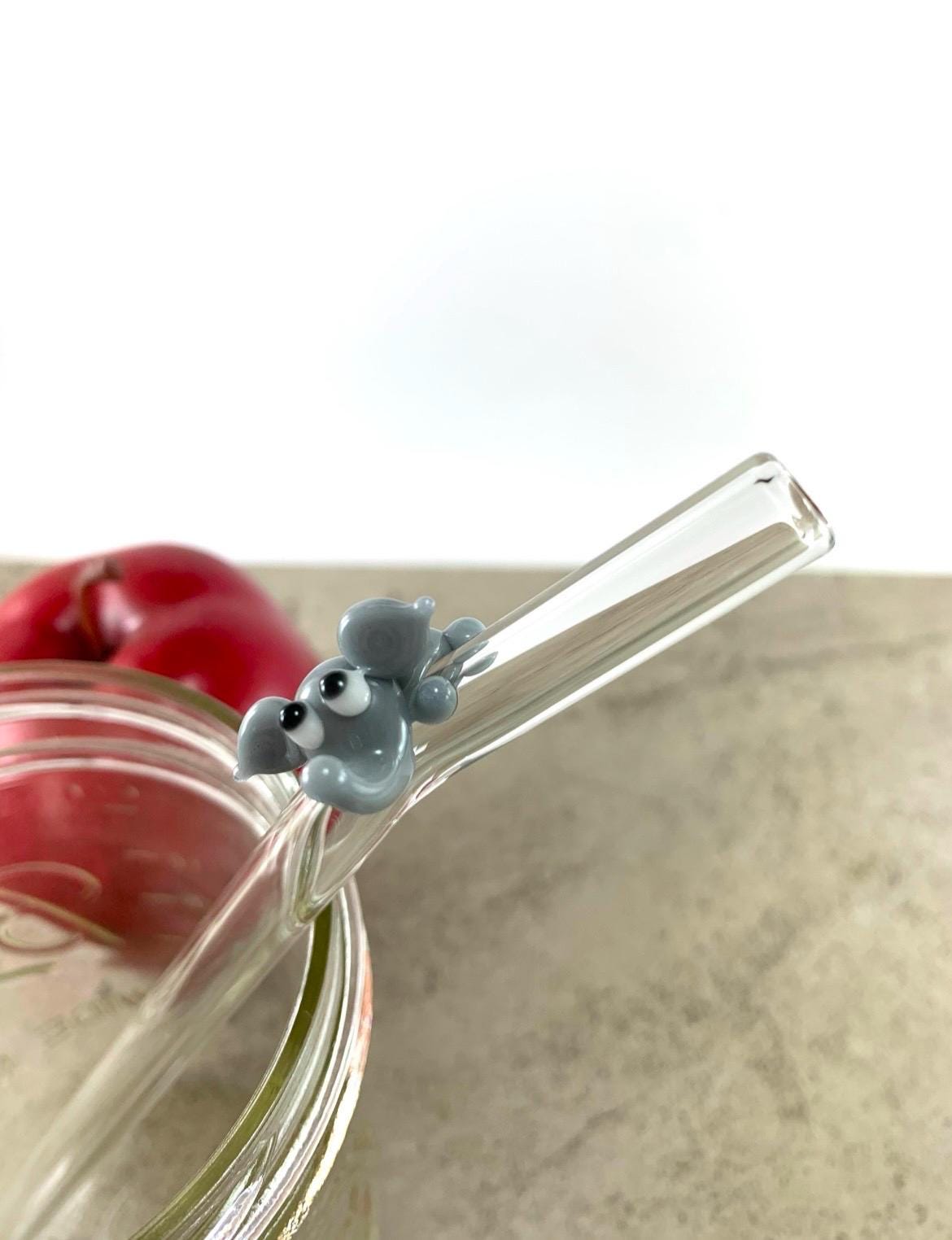Gray Elephant on Bent Clear Glass Straw