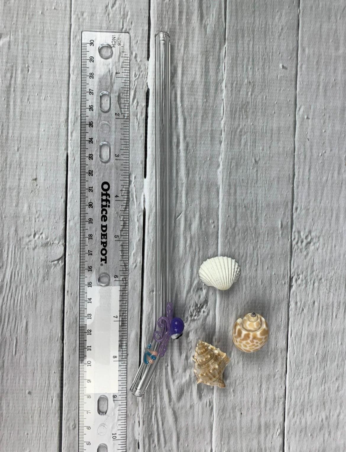 Purple Octopus and Shell on Bent Clear Glass Straw