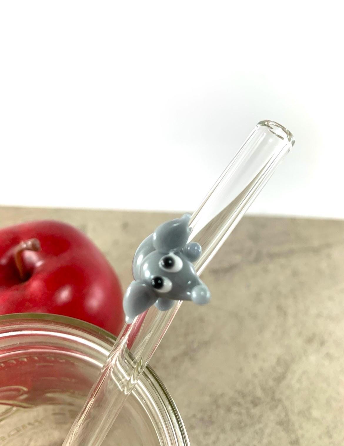 Gray Elephant on Bent Clear Glass Straw