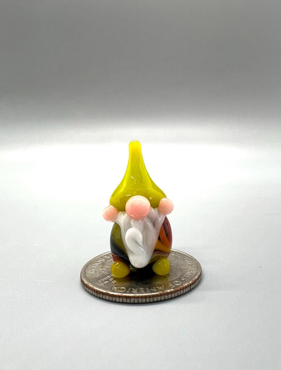 Tiny Glass Gnome Figurine- Striped Rainbow Pajamas- Bright Green Hat